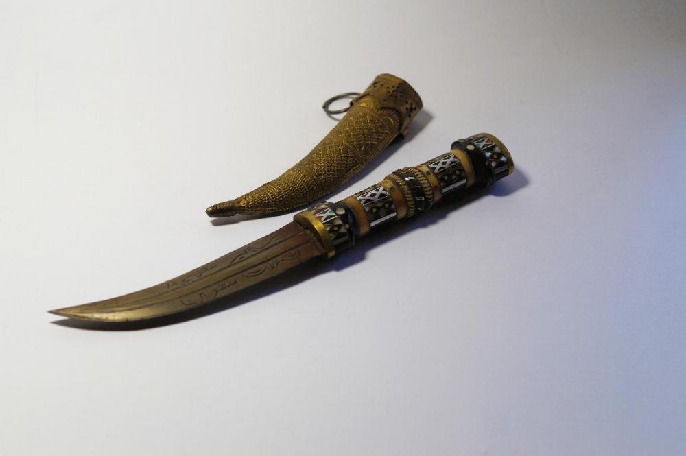 One intimidation tactic was leaving a dagger and a note where the target would find it.