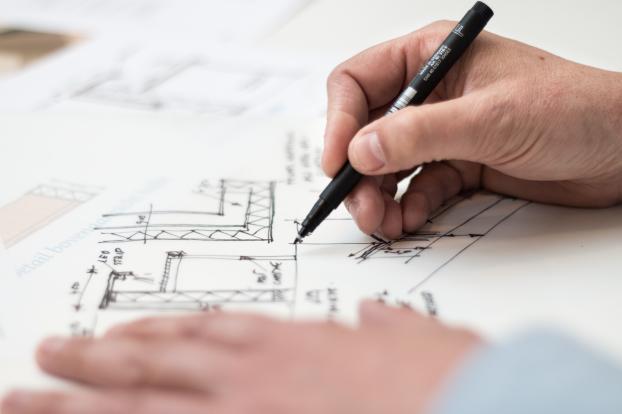 Building codes often require demising walls to be insulated and fire rated.
