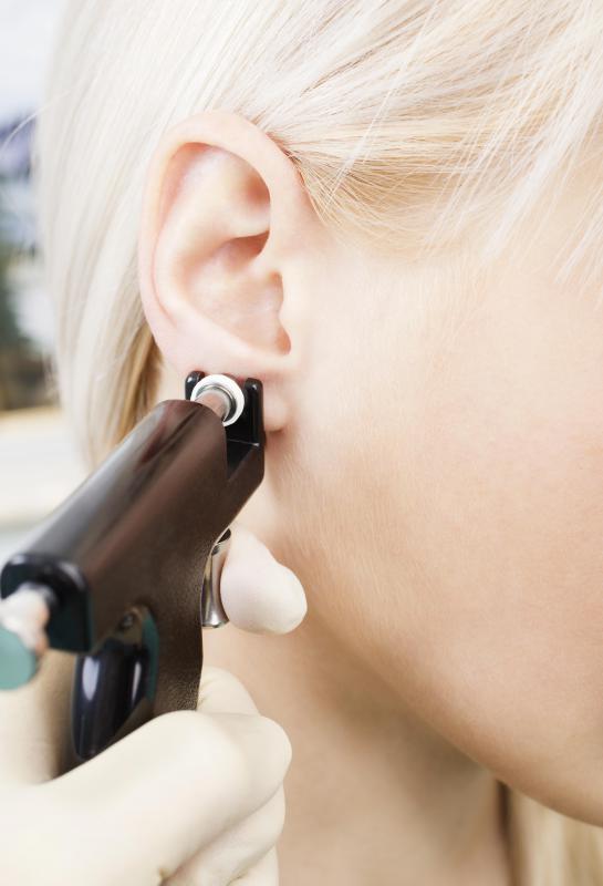 How do you pierce your own ear? | reference.com