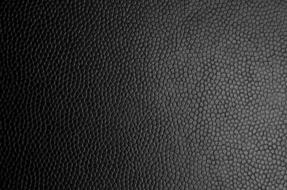 Faux leather is often seen in "crocodile" patterns and can be made in a variety of different colors.