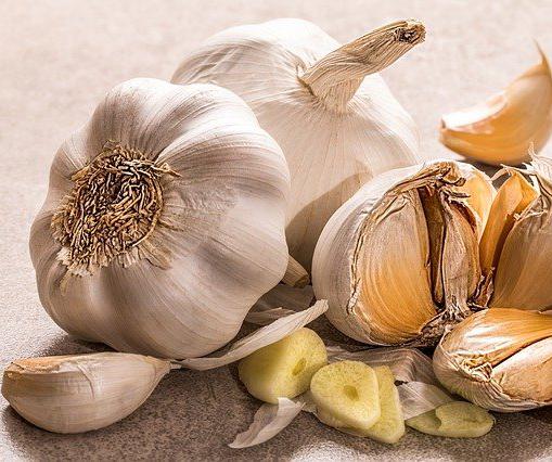 You can "taste" garlic by stepping on a cut or crushed clove. Garlic has a compound called allicin that can penetrate your pores and travel in your bloodstream to your mouth and nose.