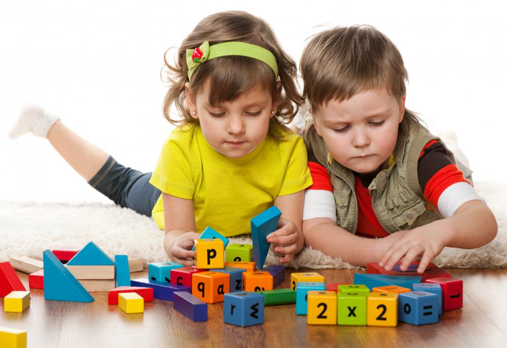 Day care centers often teach basic language and math skills to prepare children for school.
