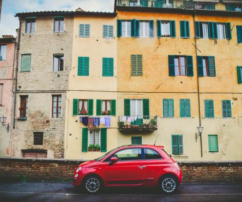 A demising wall separates spaces belonging to different tenants, as in an apartment complex or row of townhouses.
