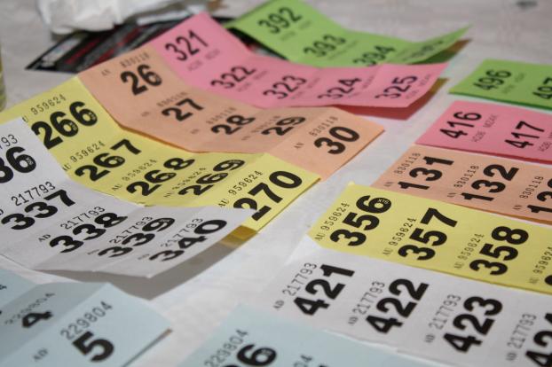 At a Chinese auction, bidders place tickets in a bowl or bucket next to the item on which they want to bid.