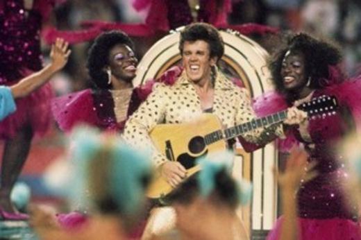 In 1989, Coca-Cola distributed 26 million pairs of 3D glasses for the Super Bowl XXIII halftime show featuring Elvis impersonator/magician "Elvis Presto."