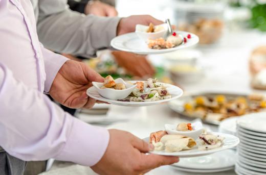 The duties of a food service specialist includes placing the food on the plate.