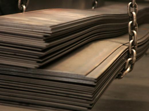 Sheet metal workers measure, shape and cut sheets of metal.