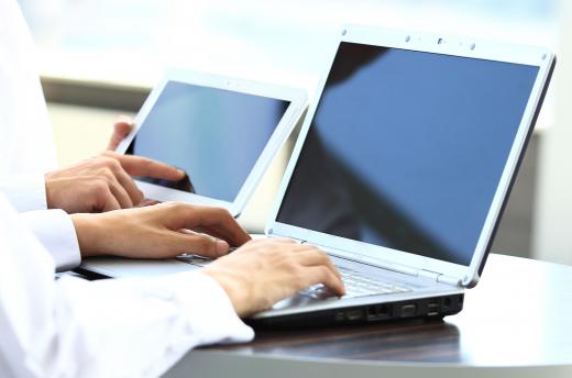 Wireless networking makes it easier for people working on computers to interface.