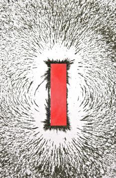 A bar magnet, which will always align itself with the magnetic north and south poles of the Earth.