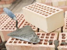 A brick trowel and bricks