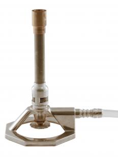 A Bunsen burner, which is used in working with chemicals.