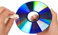 Use a soft, lint-free cloth to clean a CD or DVD.