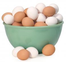 Brown and white chicken eggs.