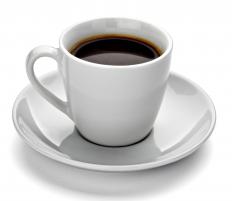 A cup of coffee, which contains caffeine.