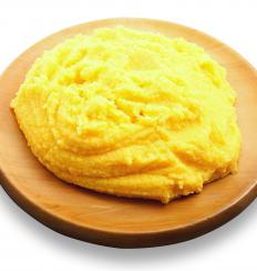 Pork belly is often served with polenta.