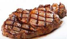 Red meat is a good source of protein, but also contains fat and cholesterol.