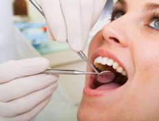 A woman having a dental exam.