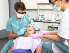 A woman getting a dental cleaning.