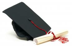 A mortarboard and diploma for an associate's degree in radiology.