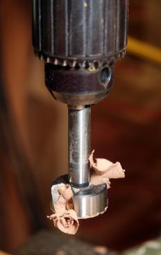 A drill with a Forstner bit.