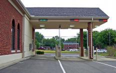 Some bank cashiers serve customers from their cars.