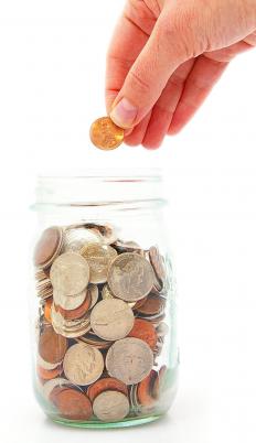 Dropping a penny in a coin jar