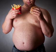 Cutting out junk food and exercising more can help get rid of abdominal fat.