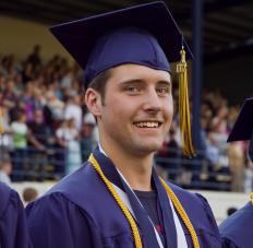 A high school student at graduation.