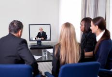 Group of businesspeople in a video conference.