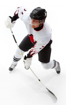 Hockey player preparing to shoot the puck