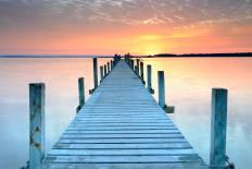 Someone might use visual imagery to image a jetty over the ocean at sunset.