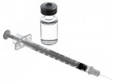A syringe and container of morphine.