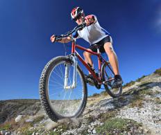 A man riding a mountain bike in a wilderness resort.