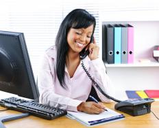 A receptionist working in a front office.