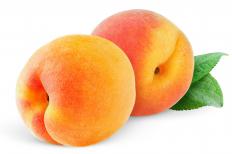 Chopped fruit, like peaches, can add sweetness to a couscous dish.