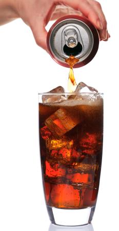 A glass of diet soda containing aspartame.