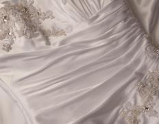 A close up of a wedding dress.