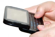 A person using a messaging phone.