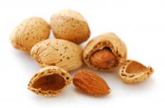 Shelled and whole almonds