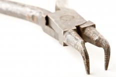 Snap ring pliers have bent tips to fit into the snap ring for easy attachment and removal.