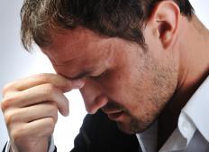 A man with a headache and nausea.