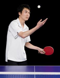 An athlete playing ping pong.