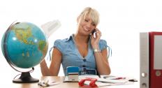 A travel agent making arrangements for a client.