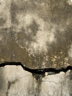 A cracked concrete sidewalk.