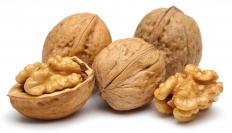 Walnuts can be a crunchy addition to mango cake.