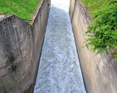 A penstock is designed to regulate the flow of water that is released.