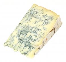 Wedge of gorgonzola cheese, which can be used to make a sauce for fettuccine.