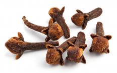 Cloves, which have a long calyx that leads to four petals.