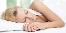 A woman asleep.