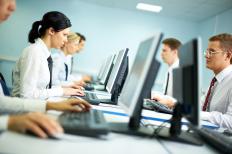 People working in a white collar job.